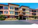 Well-maintained condo exterior with balconies and a welcoming entrance at 13941 Clubhouse Dr # 308, Tampa, FL 33618