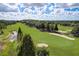 Picturesque golf course with tree-lined fairways and well-placed sand traps at 13941 Clubhouse Dr # 308, Tampa, FL 33618
