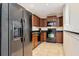 Well-equipped kitchen featuring stainless steel appliances, ample cabinets, and granite countertops at 13941 Clubhouse Dr # 308, Tampa, FL 33618