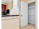 Hallway closet features ample storage space with shelving and easy access at 13941 Clubhouse Dr # 308, Tampa, FL 33618
