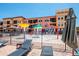 Community splash pad with water features and comfortable lounging for poolside relaxation at 13941 Clubhouse Dr # 308, Tampa, FL 33618