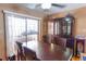 Traditional dining room with wood table, chairs, and glass-door cabinet at 1512 W Sitka St, Tampa, FL 33604