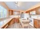 A kitchen featuring a large window, an island, and plenty of counter space at 16930 Sweetwater Rd, Dade City, FL 33523