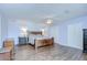Spacious main bedroom features hardwood floors, dual closets, and ensuite bath at 16930 Sweetwater Rd, Dade City, FL 33523