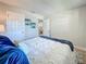 Relaxing bedroom with a comfortable bed, stylish pillows, and neutral wall color at 1701 Pinehurst Rd # 16C, Dunedin, FL 34698