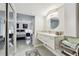 Bathroom with modern vanity and shower that connects to bedroom at 1801 E Lake Rd # 3A, Palm Harbor, FL 34685