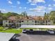 Units with balconies showcase the community and assigned covered parking spaces at 1801 E Lake Rd # 3A, Palm Harbor, FL 34685