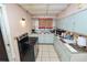 Kitchen featuring a stove and ample countertop space for meal preparation at 2504 Jim Johnson Rd, Plant City, FL 33566