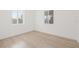 Bright bedroom features hardwood floors and plenty of natural light at 3008 W Van Buren Dr, Tampa, FL 33611