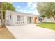 Inviting home exterior with well-maintained yard and modern accents at 3008 W Van Buren Dr, Tampa, FL 33611