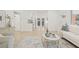 Open-concept living space with a seamless flow between the kitchen and the living area at 3008 W Van Buren Dr, Tampa, FL 33611