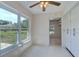 Bright breakfast nook offers large windows overlooking the landscaped backyard at 3053 Gregor Ct, Palm Harbor, FL 34684