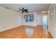 Inviting living space featuring wood-look flooring, natural light, and closet at 3053 Gregor Ct, Palm Harbor, FL 34684