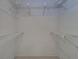 Spacious walk-in closet with wire shelving, perfect for organization and storage at 3053 Gregor Ct, Palm Harbor, FL 34684