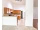 Eat-in kitchen with appliances, ample cabinet space, and tile flooring at 3095 Coronet Ct, Spring Hill, FL 34609