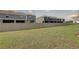 Large backyard with a privacy fence, offering plenty of space for recreation and entertaining at 33062 Frosted Clover Way, Wesley Chapel, FL 33545