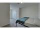 Bedroom with carpeted floors, a closet, and a twin bed ready for relaxation at 33062 Frosted Clover Way, Wesley Chapel, FL 33545