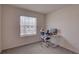 Bedroom with a desk, computer and an ergonomic chair to work from home at 33062 Frosted Clover Way, Wesley Chapel, FL 33545