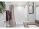 Bathroom boasts a shower and tub combination with modern fixtures and a granite vanity top at 3611 Natural Trace St, Plant City, FL 33565