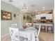 Bright dining area open to kitchen at 3611 Natural Trace St, Plant City, FL 33565
