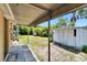 Covered patio offers shade from the Florida sun while enjoying the backyard view at 3626 S Hesperides St, Tampa, FL 33629