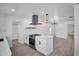 Open concept kitchen showcasing an island cooktop and plenty of light at 4000 Grove S St, St Petersburg, FL 33705