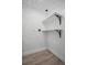 Laundry room with built in shelving at 4000 Grove S St, St Petersburg, FL 33705