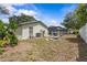 View of the backyard showing the pool and surrounding landscape at 4120 Tyndale Dr, Brandon, FL 33511