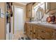 Bathroom featuring wooden vanity with mirror, sink, and toilet at 4120 Tyndale Dr, Brandon, FL 33511
