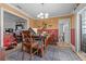 A cozy dining room with wood table, decorative accents, and neutral decor at 4120 Tyndale Dr, Brandon, FL 33511