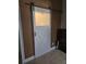 Stylish interior barn door with metal hardware and frosted glass adds character to the room at 4120 Tyndale Dr, Brandon, FL 33511