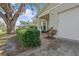 Home entry featuring brick, landscaping, covered porch and house number at 4120 Tyndale Dr, Brandon, FL 33511