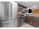 Kitchen showcasing stainless steel appliances and dark wood cabinets at 4120 Tyndale Dr, Brandon, FL 33511