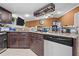 Kitchen showcasing granite countertops and stainless steel dishwasher at 4120 Tyndale Dr, Brandon, FL 33511