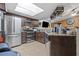Well-equipped kitchen featuring stainless steel appliances, granite countertops, and ample cabinet space for cooking and storage at 4120 Tyndale Dr, Brandon, FL 33511