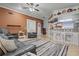 Spacious living room with bar and view into adjacent room at 4120 Tyndale Dr, Brandon, FL 33511