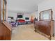 Open-concept living room showcasing neutral tile flooring and ample natural light at 4120 Tyndale Dr, Brandon, FL 33511