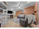 Cozy living room with fireplace, tv, and tile floors at 4120 Tyndale Dr, Brandon, FL 33511