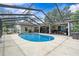 Swimming pool within screen enclosure, connecting to the outdoor patio at 4120 Tyndale Dr, Brandon, FL 33511