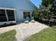 Relaxing patio with two lounge chairs, offering a private and tranquil outdoor space for unwinding and enjoying the weather at 4214 Foxboro Dr, New Port Richey, FL 34653