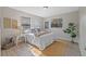 Cozy bedroom with neutral walls, hardwood floors, and ample natural light at 4226 4Th S Ave, St Petersburg, FL 33711
