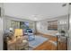 Spacious living room with wood floors, large windows and open layout at 4226 4Th S Ave, St Petersburg, FL 33711