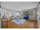 Well-lit living room showcasing hardwood floors, a large window, and stylish furnishings at 4226 4Th S Ave, St Petersburg, FL 33711