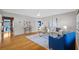 Bright living room with hardwood floors, neutral walls, and comfortable seating arrangement at 4226 4Th S Ave, St Petersburg, FL 33711