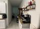 Bright kitchen featuring sleek countertops, cabinetry, and modern appliances for a functional cooking space at 4433 Eternal Prince Dr, Sun City Center, FL 33573
