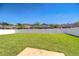 Well-maintained backyard with privacy fence and lush green lawn at 445 Arch Ridge Loop, Seffner, FL 33584