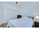 Comfortable bedroom with light walls, a fan, and a double bed at 445 Arch Ridge Loop, Seffner, FL 33584