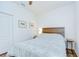 Cozy bedroom with wood floors and decorative accents at 445 Arch Ridge Loop, Seffner, FL 33584
