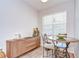Charming breakfast nook with a round table and natural light at 445 Arch Ridge Loop, Seffner, FL 33584