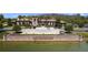 Stunning clubhouse with lush landscaping and ample parking at The Club at Estancia at 4652 San Martino Dr, Wesley Chapel, FL 33543
